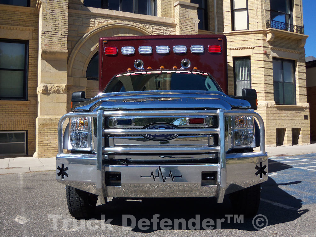A Ford Emergency Truck with a custom aluminum bumper.